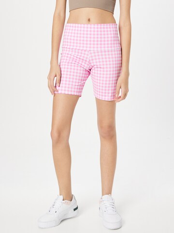 Skinny Pantalon de sport Onzie en rose : devant