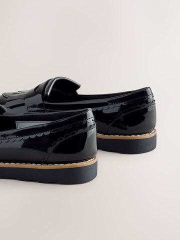 melns Next Kurpes