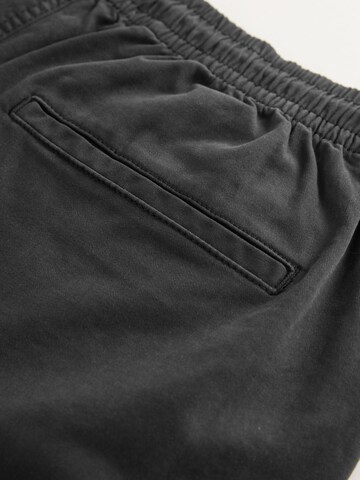 Next - regular Pantalón chino en negro