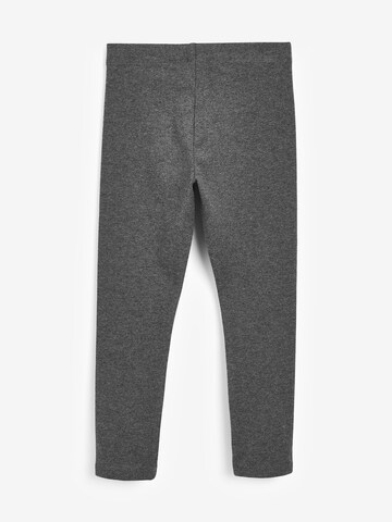 Skinny Leggings di Next in grigio