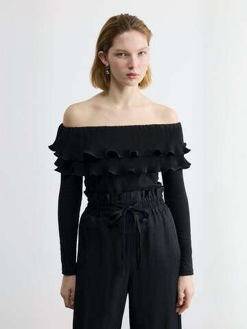 Top ' Flouncecras ' di Crās in nero: frontale