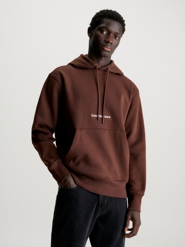 Calvin Klein Jeans Sweatshirt in Bruin: voorkant