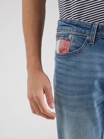 Tommy Jeans Slimfit Jeansy 'AUSTIN' w kolorze niebieski