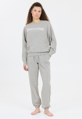 Athlecia Tapered Sporthose in Grau