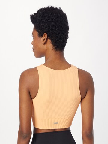 aim'n Sports top in Orange