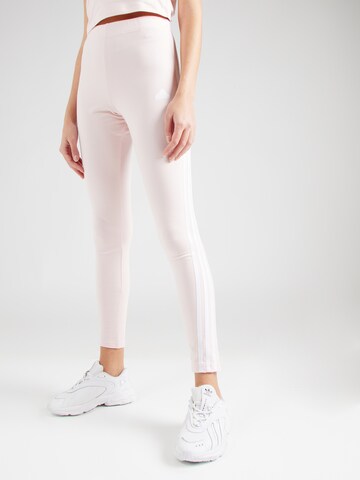 ADIDAS SPORTSWEAR - Skinny Pantalón deportivo 'FI 3S' en rosa: frente