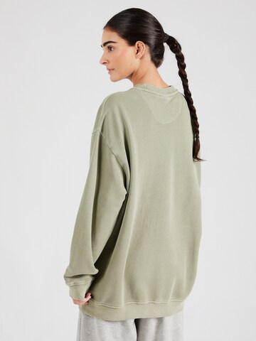 ADIDAS ORIGINALSSweater majica 'Ess' - zelena boja