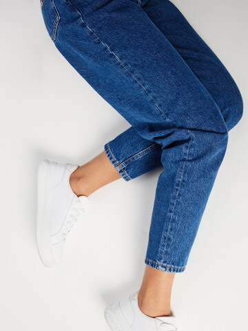 Tapered Jeans de la Tommy Jeans pe albastru