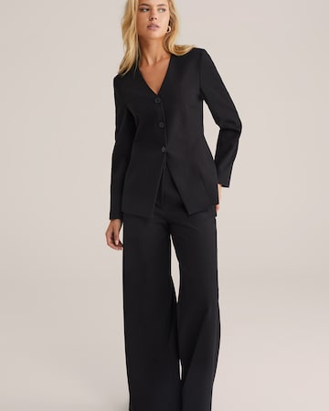 Wide leg Pantaloni con pieghe di WE Fashion in nero