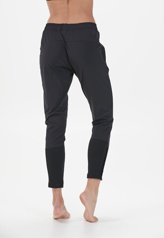 ENDURANCE Slim fit Workout Pants 'Medear' in Black