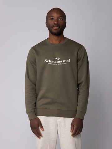 Sweat-shirt 'Schau ma moi dann seng mas scho' Watapparel en vert : devant
