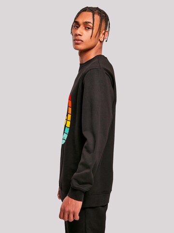 Sweat-shirt 'Alien Retro Sonnenuntergang' F4NT4STIC en noir