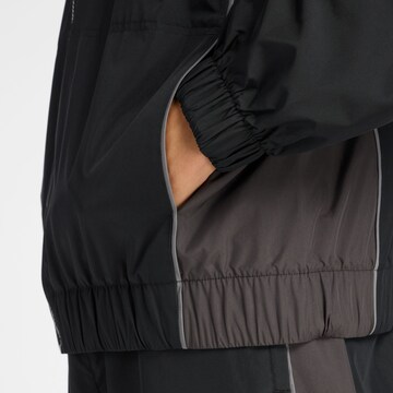 Veste mi-saison 'Trackside' new balance en noir