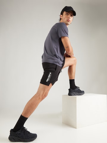 PUMA Regular Sportbroek 'FLEX' in Zwart