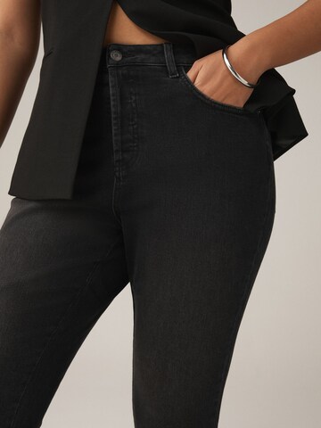 Bootcut Jeans di Next in nero