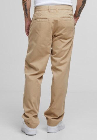 Loosefit Pantaloni chino di Urban Classics in beige