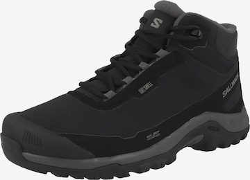 Scarpa bassa 'Shelter' di SALOMON in nero: frontale