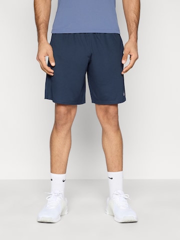 NIKE Свободный крой Спортивные штаны 'FLEX' в Синий: спереди