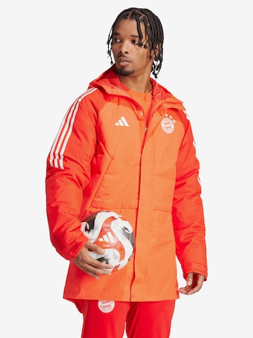 FC BAYERN MÜNCHEN Winter Jacket 'Teamline' in Orange: front