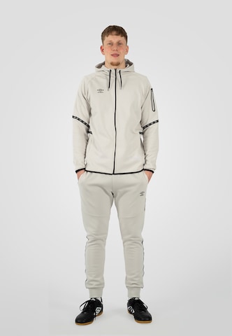 UMBRO Lużny krój Spodnie 'Terrace' w kolorze beżowy