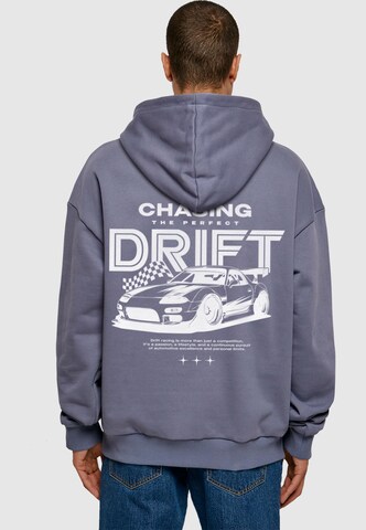 Sweat-shirt 'The Perfect Drift' Mister Tee en bleu : devant