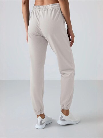 Tommy Life Tapered Nadrág 'Jogginghose' - szürke
