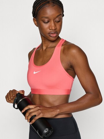 NIKE Bustier Športni nederček 'SWOOSH' | oranžna barva
