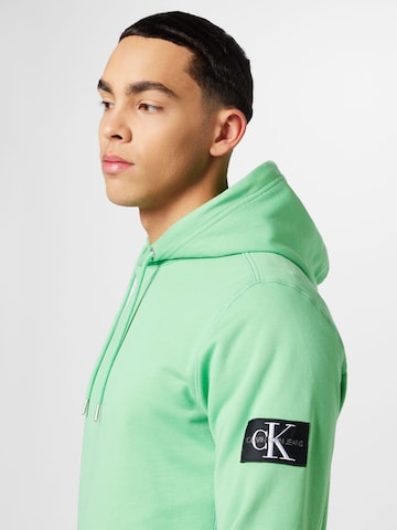 zaļš Calvin Klein Jeans Standarta piegriezums Sportisks džemperis