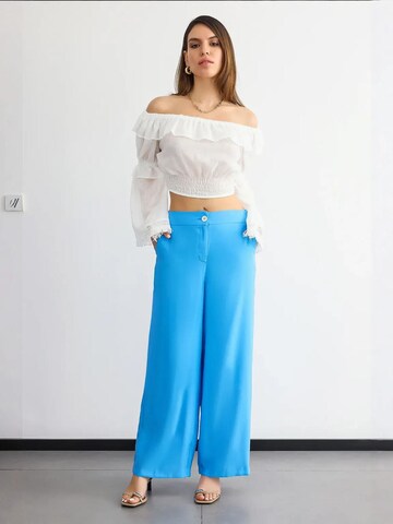 Hiccup - Perna larga Calças em azul