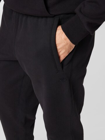 Tapered Pantaloni 'Adicolor Trefoil Sweat' di ADIDAS ORIGINALS in nero