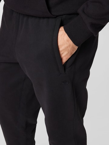 ADIDAS ORIGINALS Tapered Pants 'Adicolor Trefoil Sweat' in Black