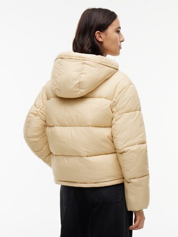 Tommy Jeans Zimní bunda – béžová