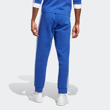 ADIDAS ORIGINALS Tapered Trousers 'Adicolor Classics' in Blue