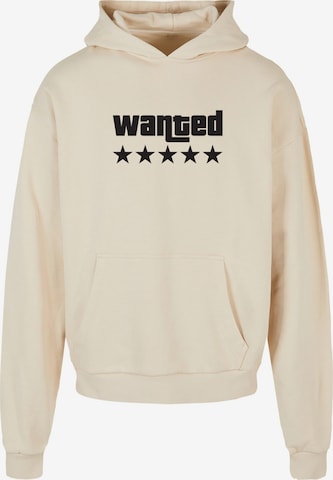 Merchcode Sweatshirt 'Wanted' in Beige: voorkant