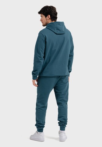 Oldskull Tapered Pants 'Basic Oldskull 25 Logo' in Blue