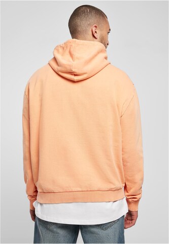 Karl Kani Sweatshirt in Orange