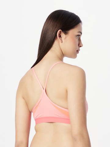 Bustino Reggiseno sportivo di NIKE in rosa