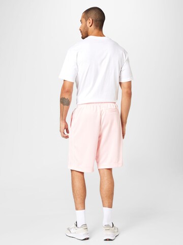 Regular Pantalon Nike Sportswear en rouge