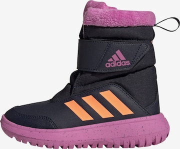 ADIDAS PERFORMANCE Boots in Black: front