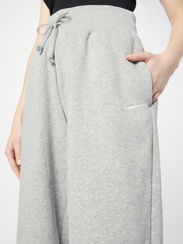 Nike Sportswear Zúžený Kalhoty 'Phoenix Fleece' – šedá