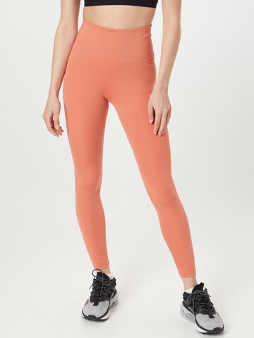 Skinny Pantalon de sport 'One' NIKE en orange : devant