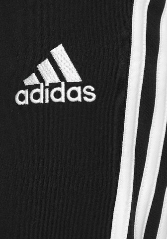 ADIDAS SPORTSWEAR Tapered Urheiluhousut 'Essentials' värissä musta