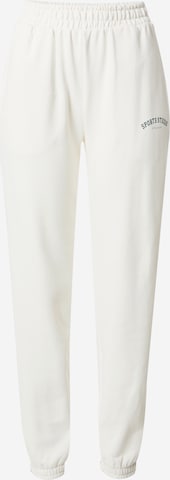 Athlecia Tapered Workout Pants in White: front