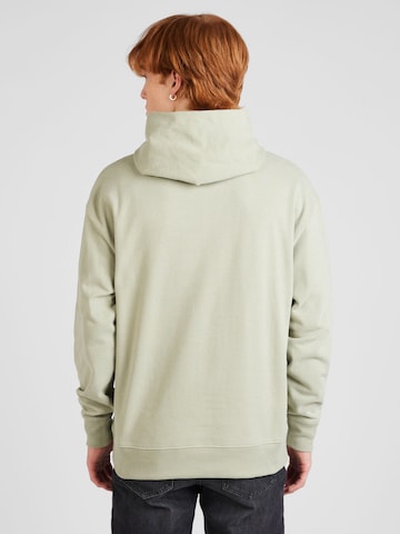 Tommy Jeans Zip-Up Hoodie in Green