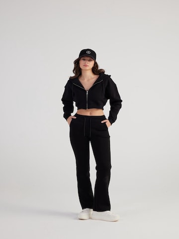 HOLLY LOLLY Regular Trousers in Black