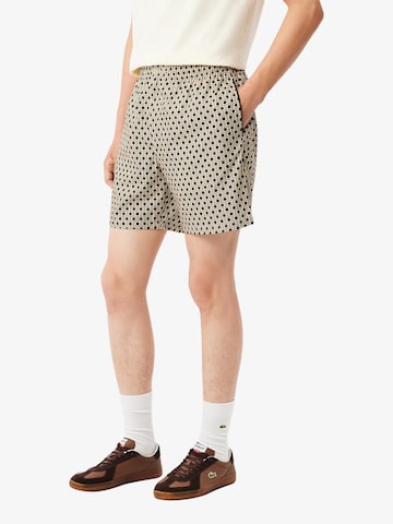 Loosefit Pantalon LACOSTE en beige : devant