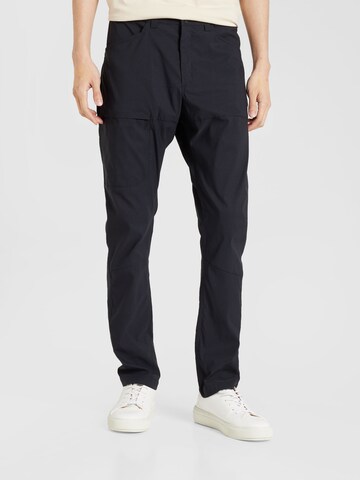 Coupe slim Pantalon outdoor PEAK PERFORMANCE en noir : devant