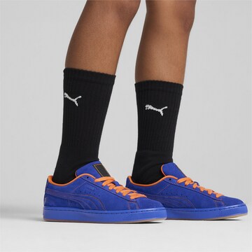 PUMA Trainers in Blue: front