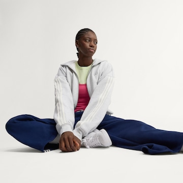 ADIDAS ORIGINALS - Sudadera con cremallera en gris