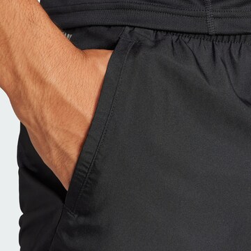 Loosefit Pantalon de sport 'Run It' ADIDAS PERFORMANCE en noir